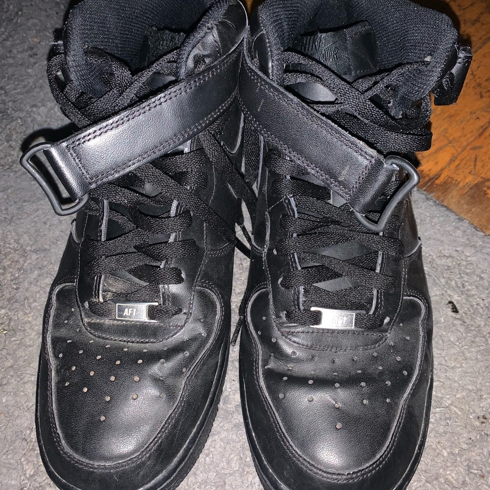 Black Air Force one high tops with a Velcro strap